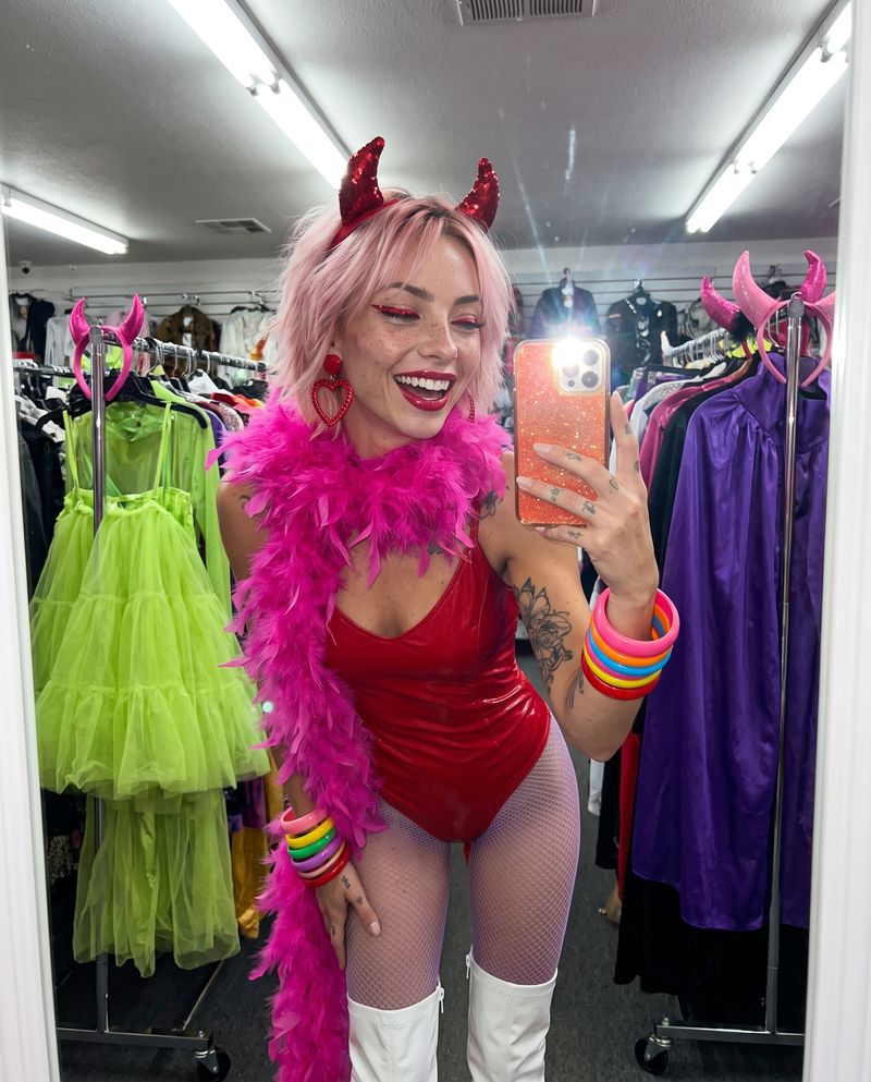 The costume shop mirror: AI avatar with pink hair in a bubblegum Halloween look